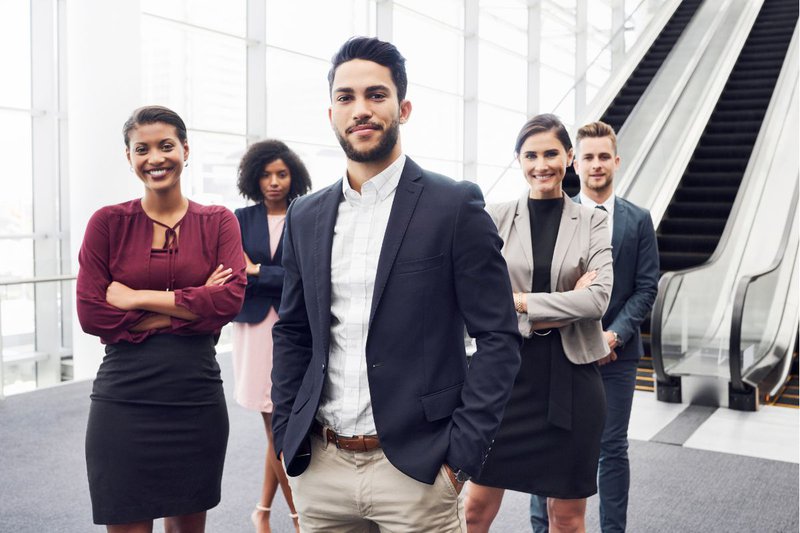 british business etiquette includes dressing smart like the people in this image