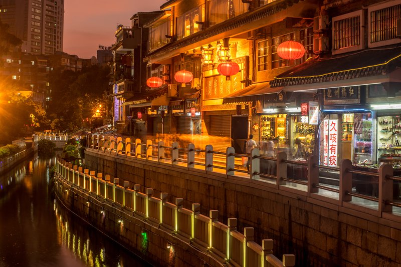 GUANGZHOU, CHINA-Oct. 18, 2015: Night view of Litchi Bay. Along the Litchi Bay there are many historical relics and historical architectures, now it's a famous tourist attraction in Guangzhou.  